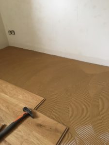 Millet revêtements de sols - pose parquet collé
